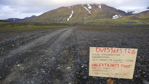 A warning sign blocks the road to Bardarbunga volcano, some 20 kilometres (12.5 miles) away, in the north-west region of the Vatnajokull glacier August 19, 2014. (Reuters / Sigtryggur Johannsson)
