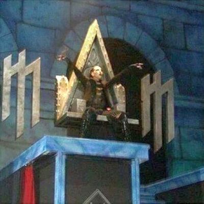 Marilyn Manson looking down from an all-seeing eye shaped throne? Source